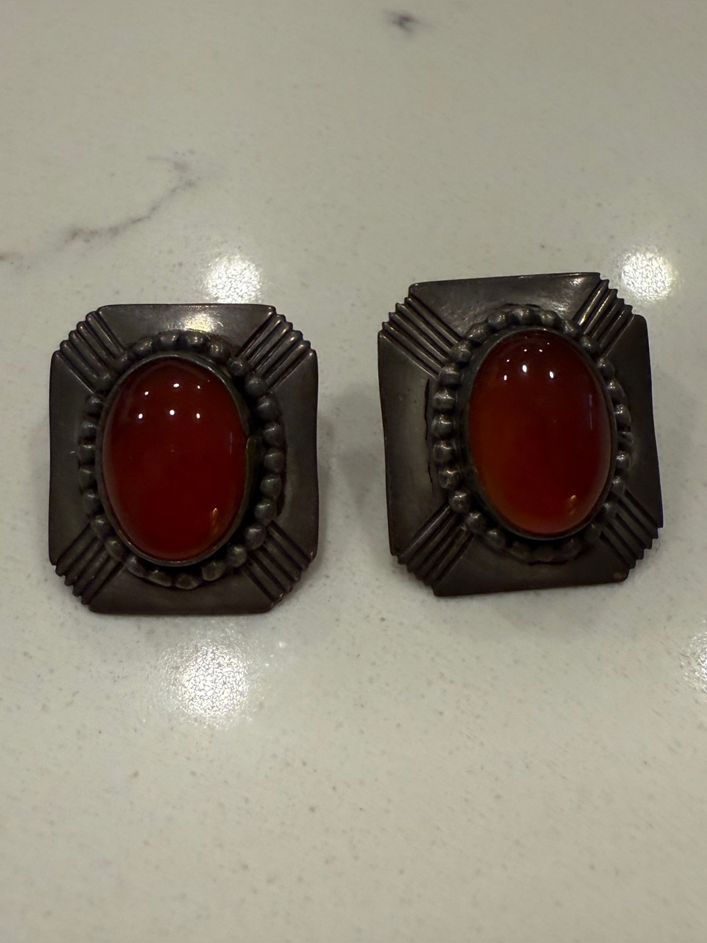 Silver-Tone Earrings with Orange Gem